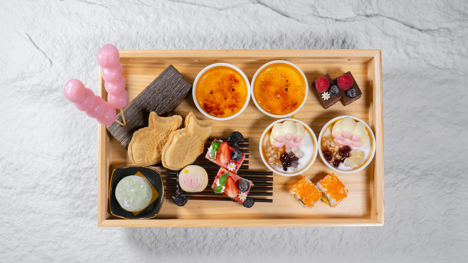 top view of a tray with variety of desserts